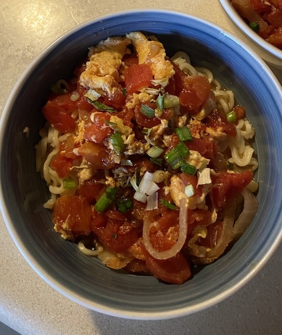 bowl of tomato and egg drop noodle soup