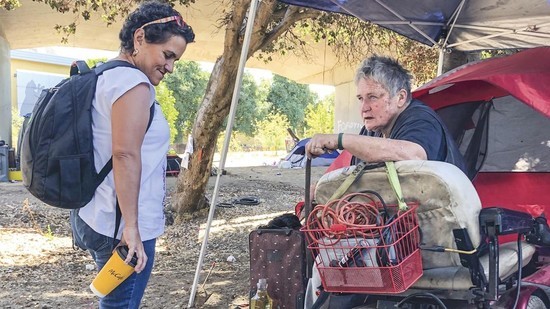 andrea-field-work-with-woman.jpg