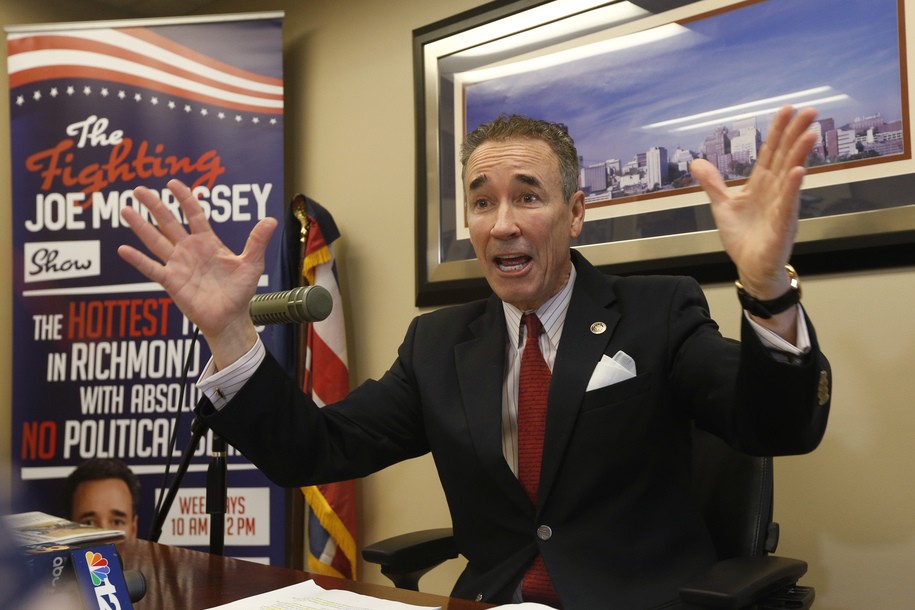 File this Thursday March 21, 2020 file photo shows Virginia State Sen. Joe Morrissey, D-Richmond, gestures during a news conference in his office at the Capitol in Richmond, Va. Morrissey, sponsored legislation that was approved by the General Assembly last week that will turn over sentencing of criminal defendants to judges instead of juries, beginning in July 2021. (AP Photo/Steve Helber)