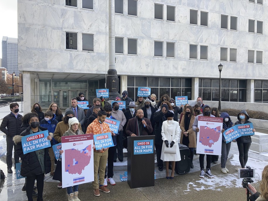 FILE - Advocates who believe that newly drawn Ohio legislative maps remain heavily gerrymandered rally outside the Ohio Supreme Court, Dec. 8, 2021, in Columbus, Ohio. The Ohio Supreme Court has, in a 4-3 ruling, Wednesday, May 25, 2022, rejected another round of Republican-drawn Statehouse maps and returned them to the Ohio Redistricting Commission. (AP Photo/Andrew Welsh-Huggins, File)