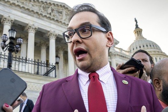 FILE - Rep. George Santos, R-N.Y., speaks to reporters outside the Capitol, in Washington, May 17, 2023.  The House Ethics panel says it has found “substantial evidence” of lawbreaking by Republican Rep. George Santos of New York and has referred its findings to the Justice Department. (AP Photo/J. Scott Applewhite, File)