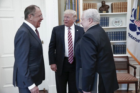 U.S. President Donald Trump meets with Russian Foreign Minister Sergey Lavrov, left, next to Russian Ambassador to the U.S. Sergei Kislyak at the White House in Washington, Wednesday, May 10, 2017. Trump on Wednesday welcomed Vladimir Putin's top diplomat to the White House for Trump's highest level face-to-face contact with a Russian government official since he took office in January. (Russian Foreign Ministry Photo via AP)