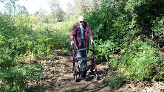 Dadwalkingthroughthewoodedtrail.jpg