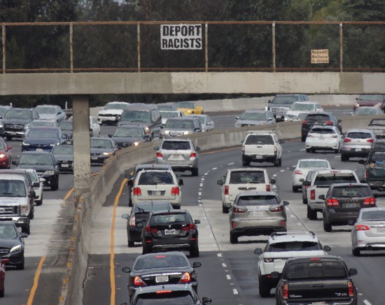 Deport Racists sign over US 101