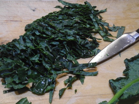 Ingredients for garlic soup with kale and pancetta - 1 cup of shredded kale.