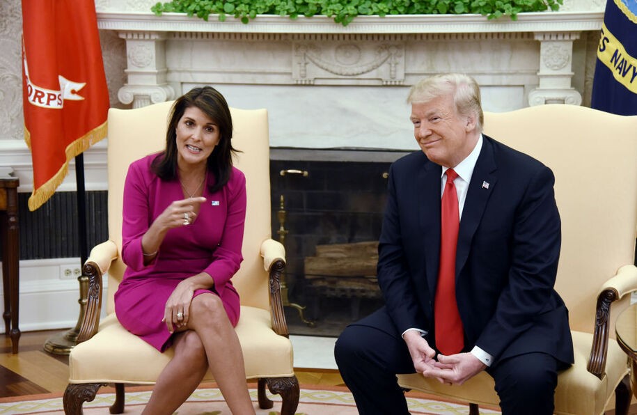 US President Donald Trump meets with Nikki Haley, the United States Ambassador to the United Nations  in the Oval office of the White House on October 9, 2018 in Washington, DC. - Nikki Haley resigned Tuesday as the US ambassador to the United Nations, in the latest departure from President Donald Trump's national security team. Meeting Haley in the Oval Office, Trump said that Haley had done a 'fantastic job' and would leave at the end of the year. (Photo by Olivier Douliery / AFP)        (Photo credit should read OLIVIER DOULIERY/AFP via Getty Images)