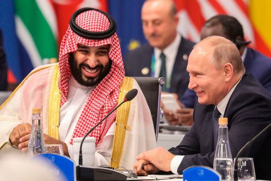 Russia's President Vladimir Putin (R) and Saudi Arabia's Crown Prince Mohammed bin Salman attend the G20 Leaders' Summit in Buenos Aires, on November 30, 2018. - Global leaders gather in the Argentine capital for a two-day G20 summit beginning on Friday likely to be dominated by simmering international tensions over trade. (Photo by ludovic MARIN / AFP)        (Photo credit should read LUDOVIC MARIN/AFP/Getty Images)