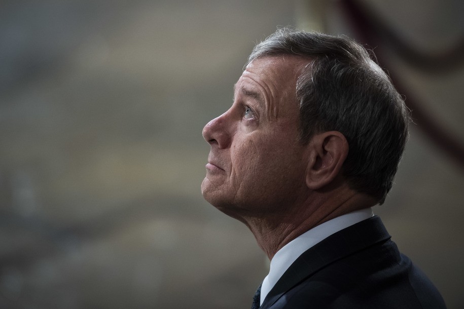 WASHINGTON, DC - DECEMBER 03:  U.S. Supreme Court Chief Justice John G. Roberts, Jr. waits for the arrival of former U.S. President George H.W. Bush at the U.S Capitol Rotunda on December 03, 2018 in Washington, DC. A WWII combat veteran, Bush served as a member of Congress from Texas, ambassador to the United Nations, director of the CIA, vice president and 41st president of the United States. A state funeral for Bush will be held in Washington over the next three days, beginning with him lying in state in the U.S. Capitol Rotunda until Wednesday morning. (Photo by Jabin Botsford - Pool/Getty Images)