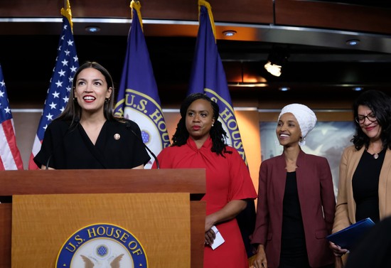 WASHINGTON, DC - JULY 15: U.S. Rep. Alexandria Ocasio-Cortez (D-NY) speaks as Reps. Ayanna Pressley (D-MA), Ilhan Omar (D-MN), and Rashida Tlaib (D-MI) listen during a press conference at the U.S. Capitol on July 15, 2019 in Washington, DC. President Donald Trump stepped up his attacks on four progressive Democratic congresswomen, saying if they're not happy in the United States "they can leave." (Photo by Alex Wroblewski/Getty Images)