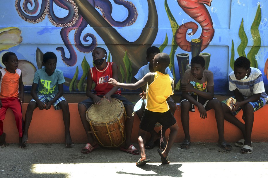 Garifuna children play traditional 'punta' music, in the municipality of Tela, Atlantida department on the Caribbean Sea, 250 km north of Tegucigalpa, on September 13, 2020, during the Covid-19 coronavirus pandemic. (Photo by ORLANDO SIERRA / AFP) (Photo by ORLANDO SIERRA/AFP via Getty Images)