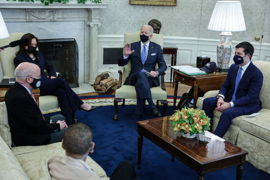 WASHINGTON, DC - MARCH 04: President Joe Biden, Vice President Kamala Harris, and Transportation Secretary Pete Buttigieg meet with a bipartisan group of House members on infrastructure in the Oval Office of the White House March 4, 2021 in Washington, DC. Participants include Rep. Peter DeFazio (D-OR) (left) and Rep. Eleanor Holmes Norton (D-DC) (center). During his campaign, President Biden proposed spending $2 trillion on infrastructure and clean energy in his first term. (Photo by Oliver Contreras-Pool/Getty Images)