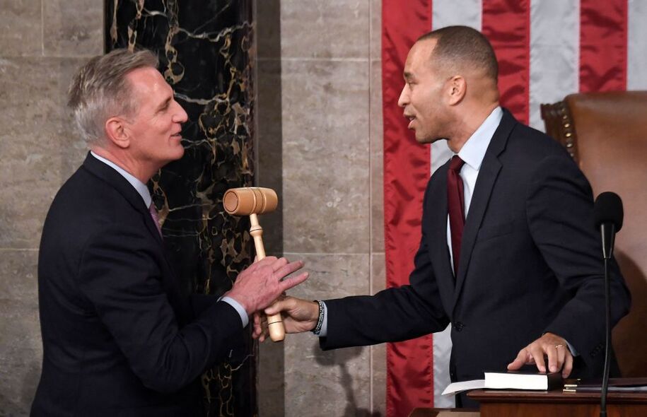 Minority Leader Hakeem Jeffries (R) hands the gavel to newly elected Speaker of the US House of Representatives Kevin McCarthy after he was elected on the 15th ballot at the US Capitol in Washington, DC, on January 7, 2023. - Kevin McCarthy's election to his dream job of speaker of the US House of Representatives was secured through a mix of bombproof ambition, a talent for cutting deals and a proven track record of getting Republicans what they need..He only won election as speaker after they forced him to endure 15 rounds of voting -- a torrid spectacle unseen in the US Capitol since 1859. (Photo by OLIVIER DOULIERY / AFP) (Photo by OLIVIER DOULIERY/AFP via Getty Images)