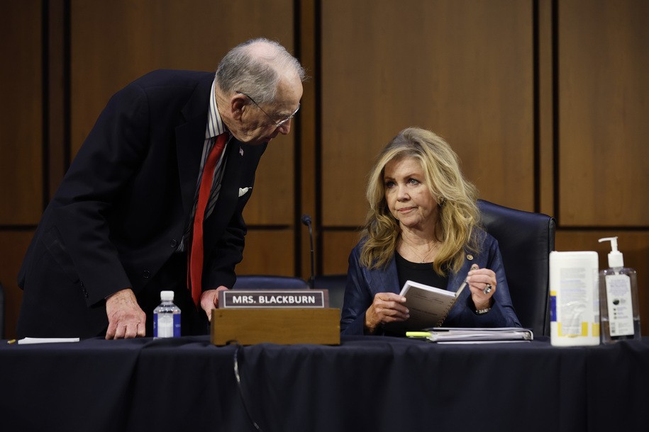 WASHINGTON, DC - MARCH 22: Senate Judiciary Committee ranking member Sen. Charles Grassley (R-IA) talks with Sen. Marsha Blackburn (R-TN) during the confirmation hearing of U.S. Supreme Court nominee Judge Ketanji Brown Jackson in the Hart Senate Office Building on Capitol Hill, March 22, 2022 in Washington, DC. Judge Ketanji Brown Jackson, President Joe Biden's pick to replace retiring Justice Stephen Breyer on the U.S. Supreme Court, would become the first Black woman to serve on the Supreme Court if confirmed.  (Photo by Chip Somodevilla/Getty Images)