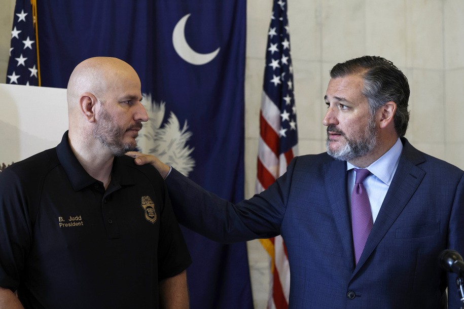 WASHINGTON, DC - JUNE 22: Sen. Ted Cruz (R-TX) looks to National Border Patrol Council President Brandon Judd as he speaks at a press conference at the U.S. Capitol to discuss immigration at the southern border on June 22, 2022 in Washington, DC. Cruz spoke alongside Sen. Lindsey Graham (R-SC) and Rep. Jim Jordan (R-OH) about what they see as a worsening crisis at the U.S.-Mexico border caused by U.S. President Joe Biden's administrationâ€™s policies. (Photo by Anna Moneymaker/Getty Images)