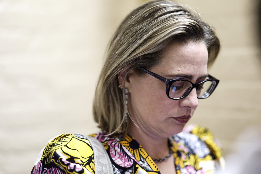 WASHINGTON, DC - AUGUST 02: Sen. Kyrsten Sinema (D-AZ) leaves her office to walk to the Senate Chambers in the U.S. Capitol Building on August 02, 2022 in Washington, DC. Negotiations in the U.S. Senate continue for the Inflation Reduction Act of 2022. (Photo by Anna Moneymaker/Getty Images)