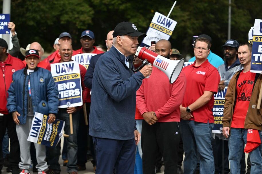 US President Joe Biden addresses a UAW picket line at a General Motors Service Parts Operations plant in Belleville, Michigan, on September 26, 2023. Some 5,600 members of the UAW walked out of 38 US parts and distribution centers at General Motors and Stellantis at noon September 22, 2023, adding to last week's dramatic worker walkout. According to the White House, Biden is the first sitting president to join a picket line. (Photo by Jim WATSON / AFP) (Photo by JIM WATSON/AFP via Getty Images)