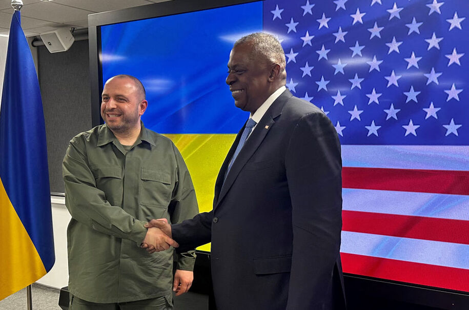 Ukrainian Defence Minister Rustem Umerov (L) greets United States Secretary of Defense Lloyd Austin prior to their talks in Kyiv on November 20, 2023. (Photo by W.G. DUNLOP / POOL / AFP) (Photo by W.G. DUNLOP/POOL/AFP via Getty Images)