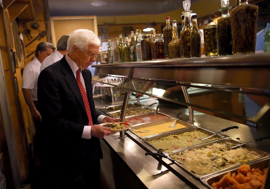 MADISON, MS - JUNE 24:  U.S. Sen Thad Cochran (R-MS) walks through the buffet line at Mama Hamil's restaurant on June 24, 2014 in Madison, Mississippi.  U.S. Senate incumbent U.S. Sen Thad Cochran (R-MS) is fighting for his political life in a tight race against Tea Party-backed republican candidate for U.S. Senate, Mississippi State Sen Chris McDaniel.  (Photo by Justin Sullivan/Getty Images)