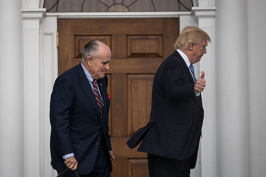 BEDMINSTER TOWNSHIP, NJ - NOVEMBER 20: (L to R) Former New York City mayor Rudy Giuliani and president-elect Donald Trump head into the clubhouse for their meeting at Trump International Golf Club, November 20, 2016 in Bedminster Township, New Jersey. Trump and his transition team are in the process of filling cabinet and other high level positions for the new administration.  (Photo by Drew Angerer/Getty Images)