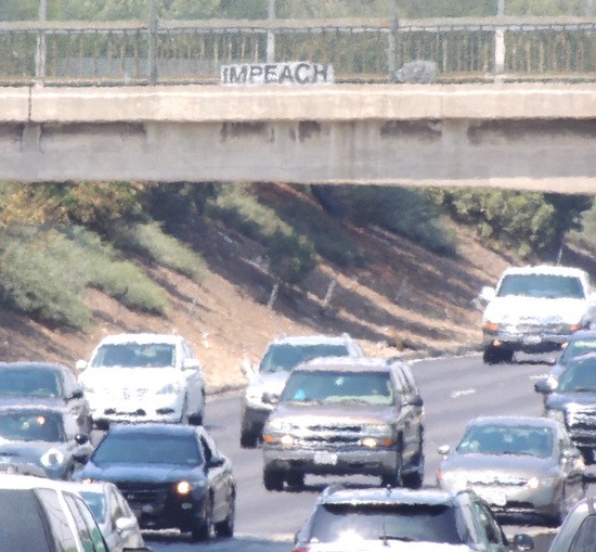 Impeach sign over I-5 north