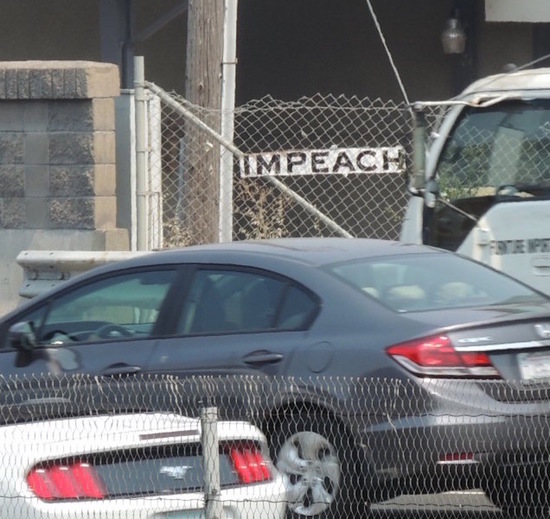 Impeach sign next to US 101 north