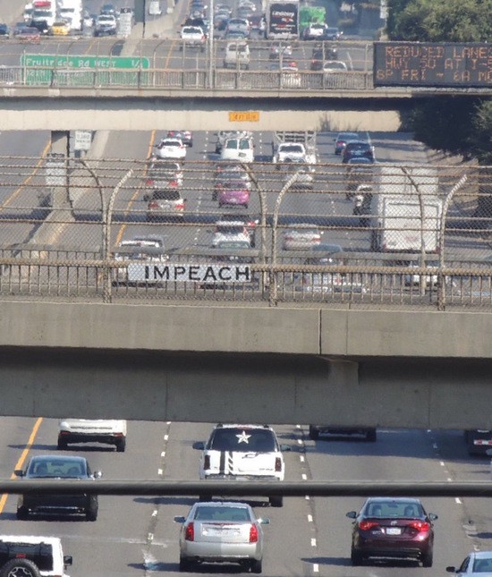 Impeach sign over Hwy 99 north