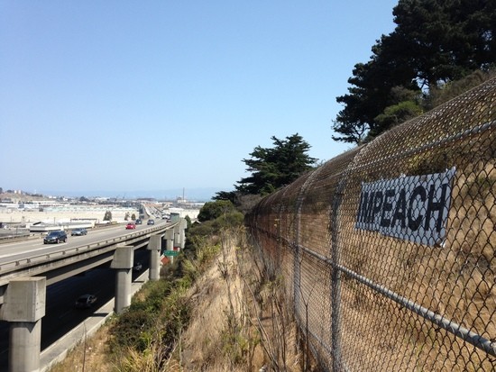 Impeach sign next to flyaway ramp on the 280.