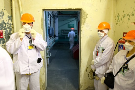 Our group dressed in two layers of anti-contamination clothing, preparing to enter the Unit 4 control room from the "Local Zone" of high contamination surrounding Unit 4.