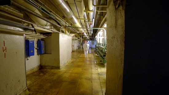 Corridor in the Chernobyl Nuclear Power Plant.  Concrete blocks a doorway to the left that formerly led to the Unit 4 reactor building.