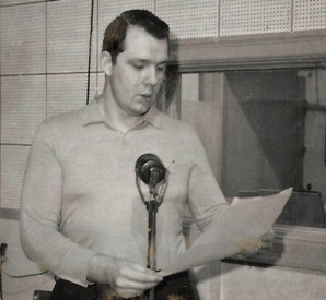 Announcer Chuck Stanley reading a commercial at station KCON in 1959