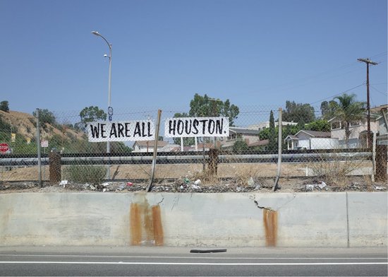 we are all Houston sign by Pasadena Freeway