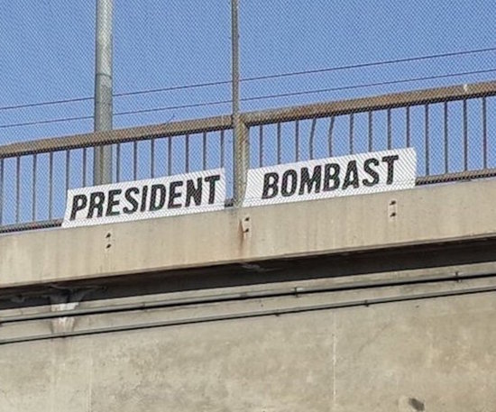 President Bombast sign over La freeway.