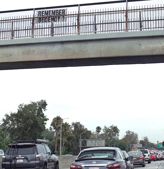 Remember Decency? sign over I-5