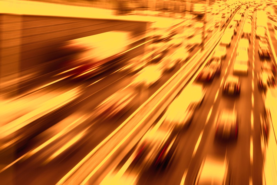 Abstract photo of rushing cars on a highway