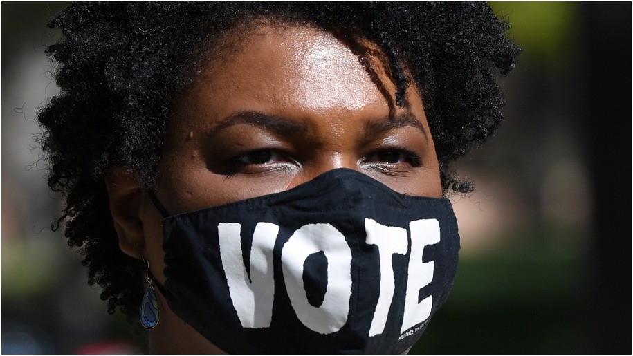 Former Georgia gubernatorial candidate Stacey Abrams waits to speak at a Democratic canvass kickoff as she campaigns for Joe Biden and Kamala Harris at Bruce Trent Park on October 24, 2020 in Las Vegas, Nevada.