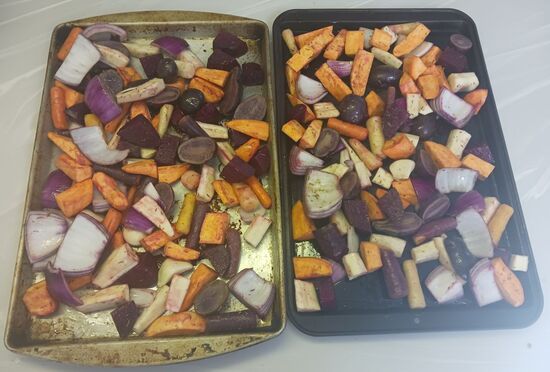 vegetables on baking sheets ready to bake