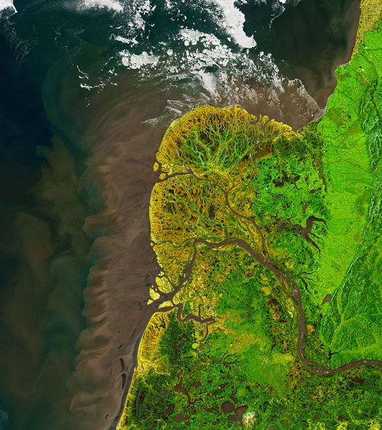 The Yukon-Kuskokwim Delta is one of the world’s largest deltas, and it stands as a remarkable example of how water and ice can shape the land. These images show the delta’s northern lobe, where the Yukon River spills into the Bering Sea along the west coast of Alaska.